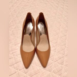 Michael Kors pumps. Never worn. Size 7.5